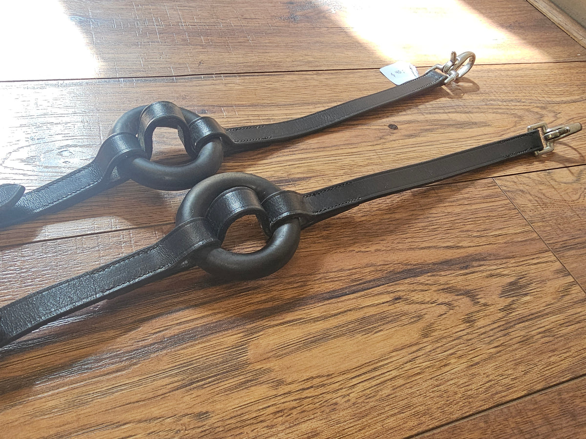 Black leather side reins used